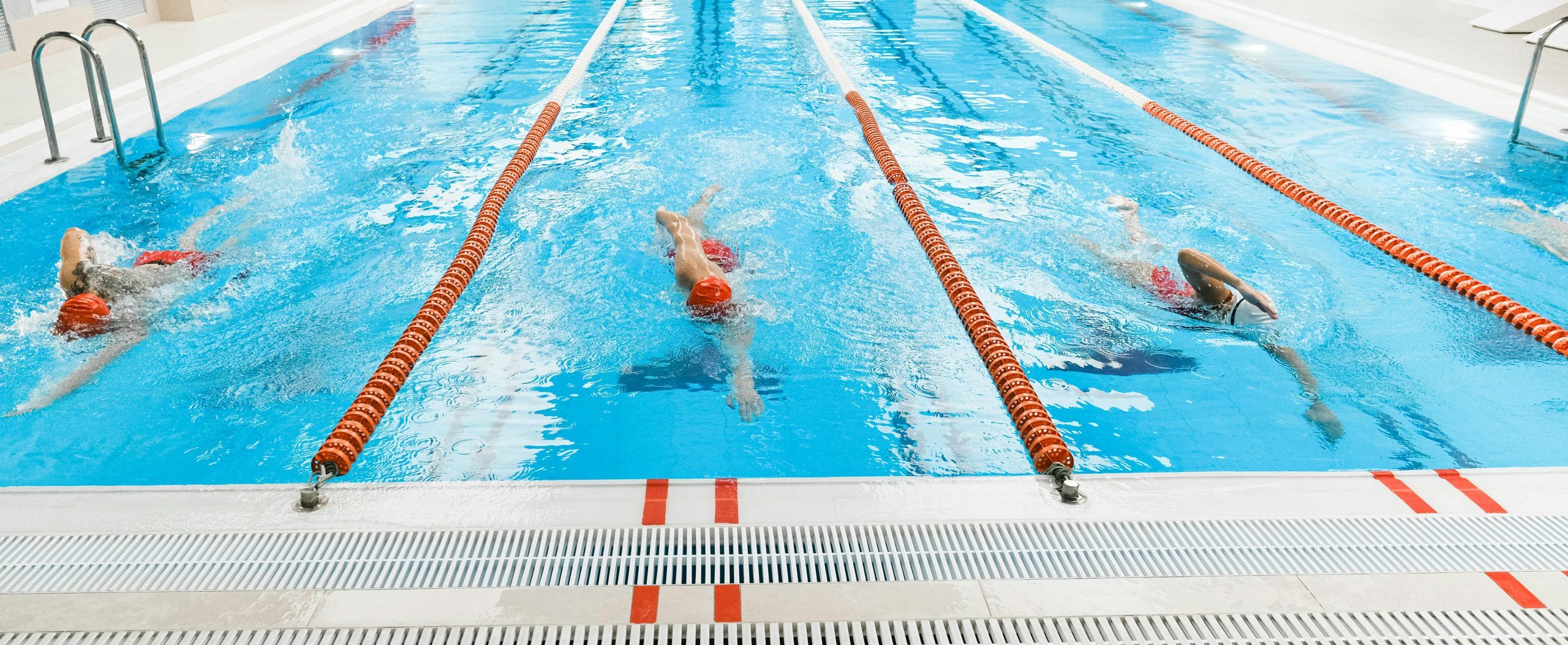 Women competing in swimming event